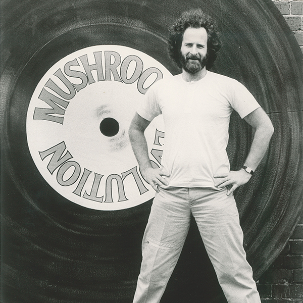 Man in front of record
